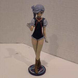 Anime Girl Figure with Blue Hair and Red Bow